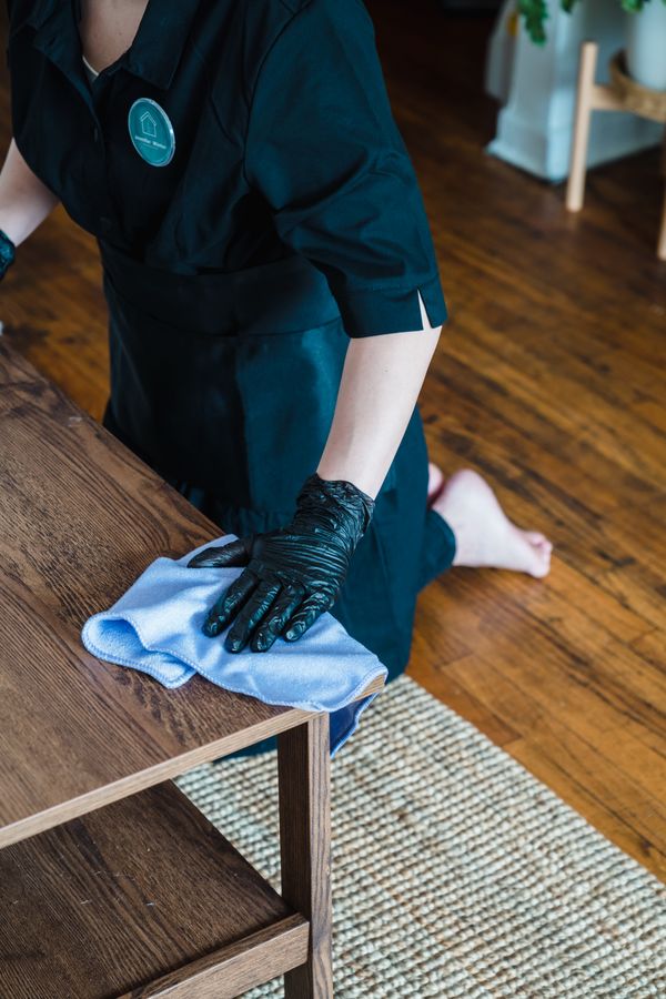 Professional cleaning a table